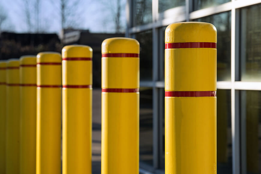 yellow plastic bollard sleeves