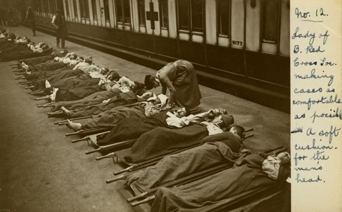 Wounded soldiers on a station platform