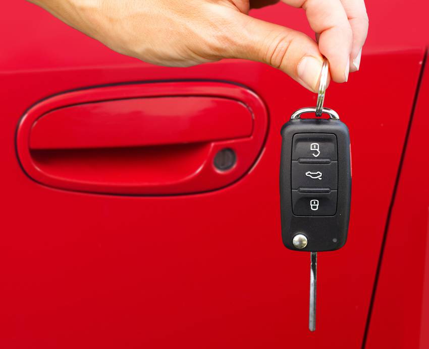 audi keys in front of car